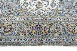 Full view of 2000s Kashan rug from Iran / Persia, 325 × 205 cm in Beige tones