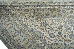 Close-up detail of 2000s Kashan rug from Iran / Persia showing Wool weave