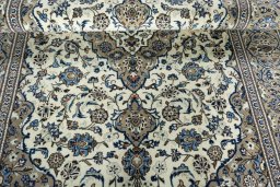 Close-up detail of 2000s Kashan rug from Iran / Persia showing Wool weave