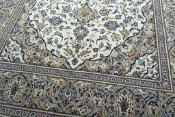 Close-up detail of 2000s Kashan rug from Iran / Persia showing Wool weave