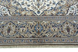 Full view of 2000s Kashan rug from Iran / Persia, 305 × 195 cm in Beige tones