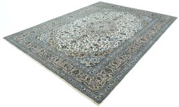 Corner detail of 2000s Kashan rug showing border pattern and Wool pile
