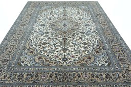 Surface texture of 2000s Kashan rug with natural Wool and intricate pattern