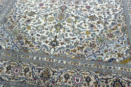 Close-up detail of 2000s Kashan rug from Iran / Persia showing Wool weave