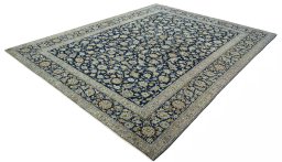 Corner detail of 2000s Kashan rug showing border pattern and Wool pile