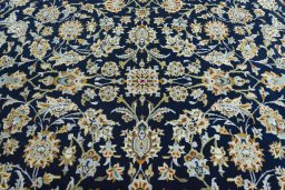 Central medallion detail of 2000s Kashan rug from Iran / Persia