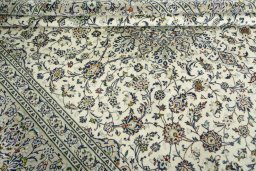 Close-up detail of 2000s Kashan rug from Iran / Persia showing Wool weave