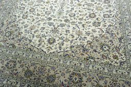 Close-up detail of 2000s Kashan rug from Iran / Persia showing Wool weave