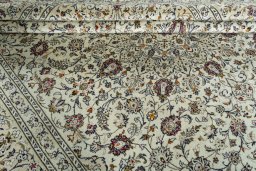 Close-up detail of 2000s Kashan rug from Iran / Persia showing Wool weave