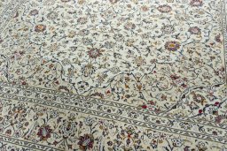 Close-up detail of 2000s Kashan rug from Iran / Persia showing Wool weave
