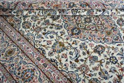 Close-up detail of 2000s Kashan rug from Iran / Persia showing Wool weave