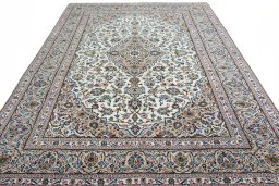 Surface texture of 2000s Kashan rug with natural Wool and intricate pattern