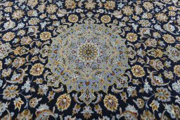 Central medallion detail of 2000s Kashan rug from Iran / Persia