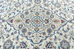 Central medallion detail of 2000s Kashan rug from Iran / Persia