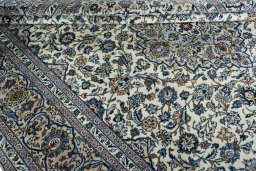 Close-up detail of 2000s Kashan rug from Iran / Persia showing Wool weave