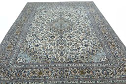 Surface texture of 2000s Kashan rug with natural Wool and intricate pattern