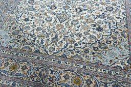 Close-up detail of 2000s Kashan rug from Iran / Persia showing Wool weave