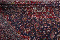 Close-up detail of 2000s Kashan rug from Iran / Persia showing Wool weave