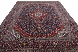 Surface texture of 2000s Kashan rug with natural Wool and intricate pattern