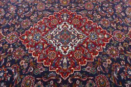 Central medallion detail of 2000s Kashan rug from Iran / Persia