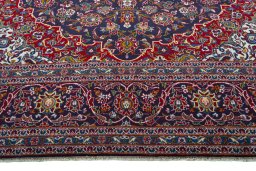 Full view of 2000s Kashan rug from Iran / Persia, 410 × 308 cm in Blue tones