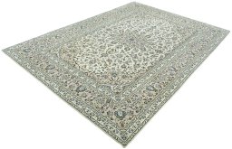 Corner detail of 2000s Kashan rug showing border pattern and Wool pile