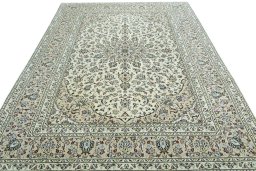 Surface texture of 2000s Kashan rug with natural Wool and intricate pattern