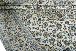 Close-up detail of 2000s Kashan rug from Iran / Persia showing Wool weave
