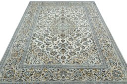 Surface texture of 2000s Kashan rug with natural Wool and intricate pattern