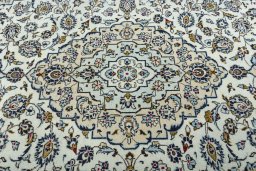 Central medallion detail of 2000s Kashan rug from Iran / Persia