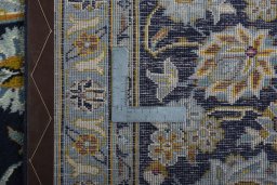 Close-up detail of 1970s Kashan rug from Iran / Persia showing Wool weave