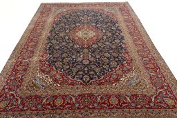 Surface texture of 2000s Kashan rug with natural Cork and intricate pattern