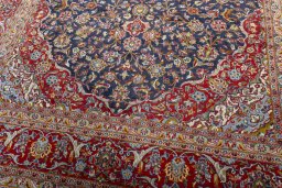 Close-up detail of 2000s Kashan rug from Iran / Persia showing Cork weave