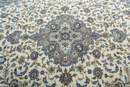 Central medallion detail of 2000s Kashan rug from Iran / Persia
