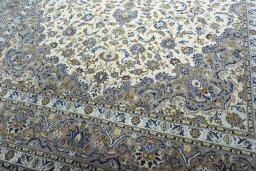 Close-up detail of 2000s Kashan rug from Iran / Persia showing Wool weave