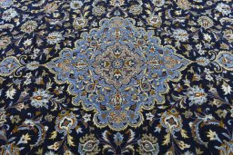 Central medallion detail of 2000s Kashan rug from Iran / Persia