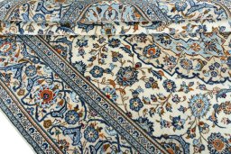 Close-up detail of 2000s Kashan rug from Iran / Persia showing Wool weave
