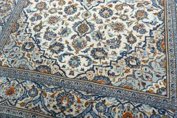 Close-up detail of 2000s Kashan rug from Iran / Persia showing Wool weave