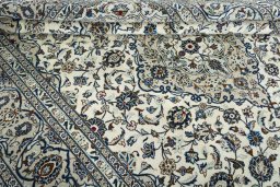Close-up detail of 2000s Kashan rug from Iran / Persia showing Wool weave
