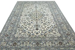 Surface texture of 2000s Kashan rug with natural Wool and intricate pattern