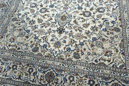 Close-up detail of 2000s Kashan rug from Iran / Persia showing Wool weave