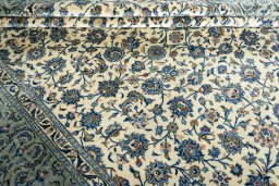 Close-up detail of 2000s Kashan rug from Iran / Persia showing Wool weave