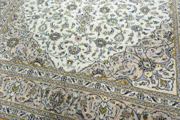Close-up detail of 2000s Kashan rug from Iran / Persia showing Wool weave