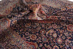 Surface texture of 2000s Kashan rug with natural Wool and intricate pattern