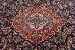 Central medallion detail of 2000s Kashan rug from Iran / Persia