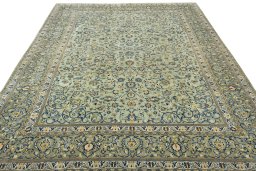 Surface texture of 2000s Kashan rug with natural Wool and intricate pattern