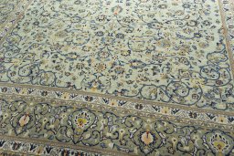Close-up detail of 2000s Kashan rug from Iran / Persia showing Wool weave