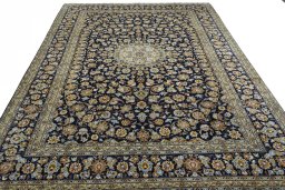 Surface texture of 2000s Kashan rug with natural Wool and intricate pattern