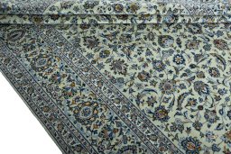 Close-up detail of 2000s Kashan rug from Iran / Persia showing Wool weave