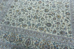 Close-up detail of 2000s Kashan rug from Iran / Persia showing Wool weave